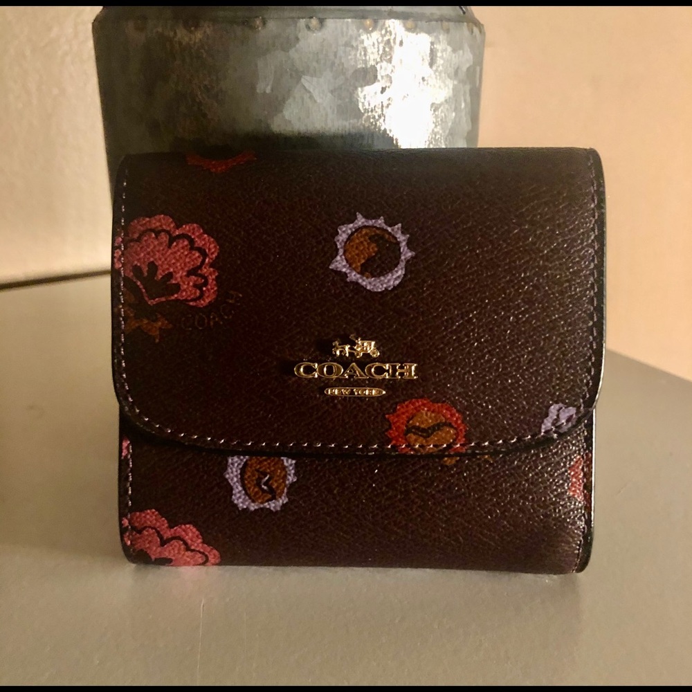 Small brown Coach brown floral wallet